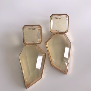 Gold tone statement earrings.